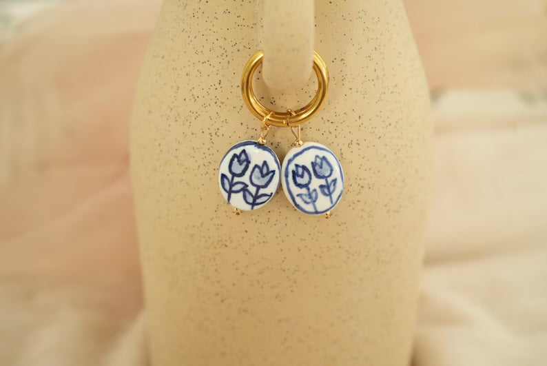 The blue earrings