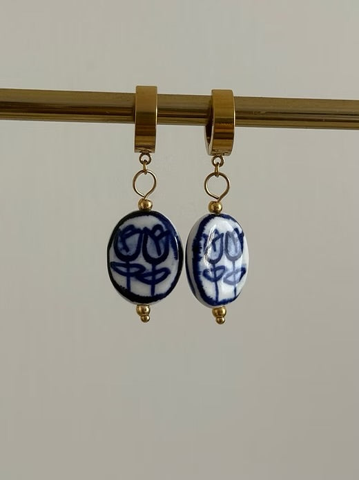 The blue earrings