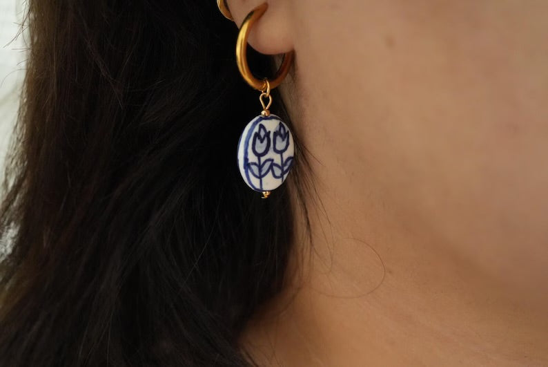 The blue earrings